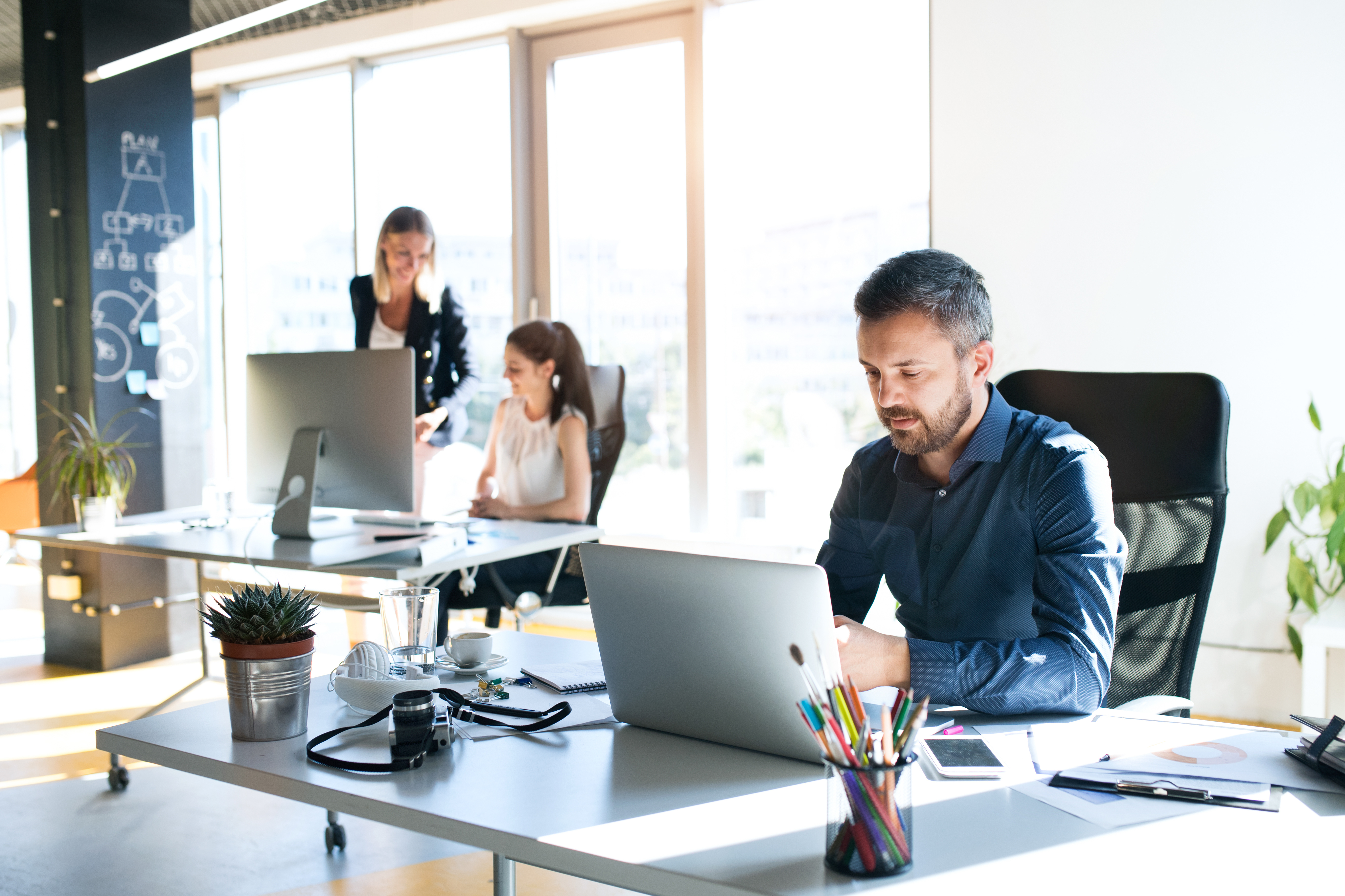 group of people working in an office
